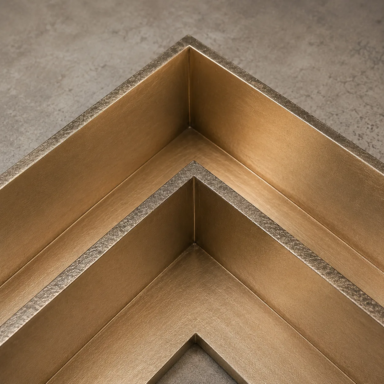 Warm-toned custom metal fabrication detail.